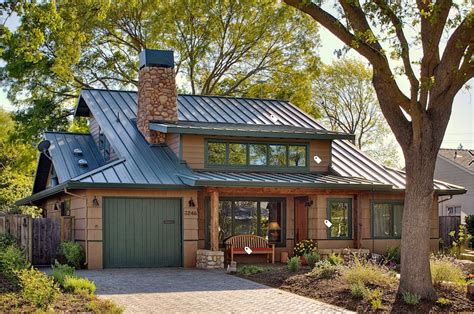 dark gray house with green metal roof|gray homes with black roofs.